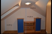 otroška soba v mansardi z merami stropov
